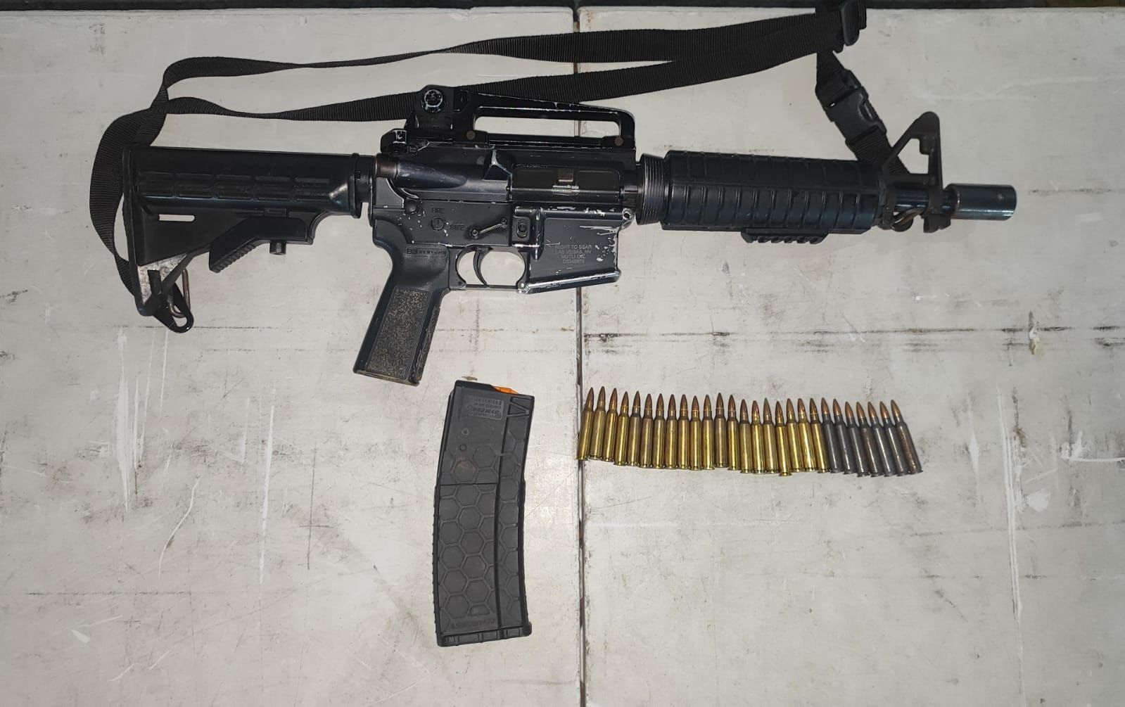 27-cartuchos-arma-joven .jpg