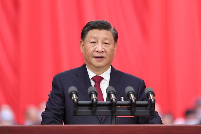 Xi