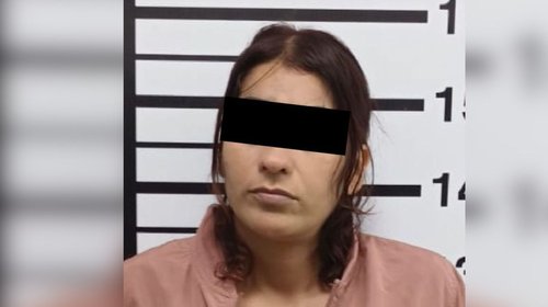 Detienen a mujer en hotel con orden por robo calificado