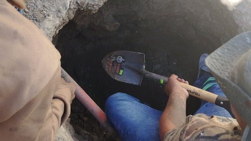 Halla colectivo cuerpo de joven en cochera de casa en Jalisco
